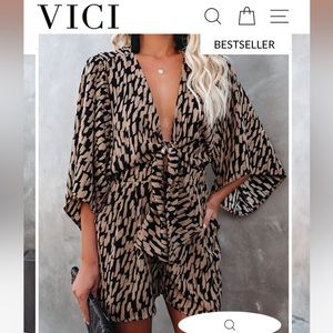 “Flawless” printed romper with pockets, fun sleeves, and tie front.